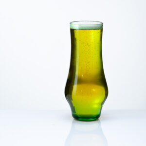 Sexy green pilsner glass inspired by St. Patrick's Day full of beer!
